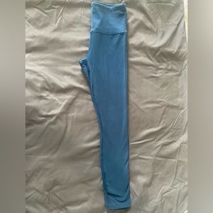 Small, blue Forever 21 leggings.